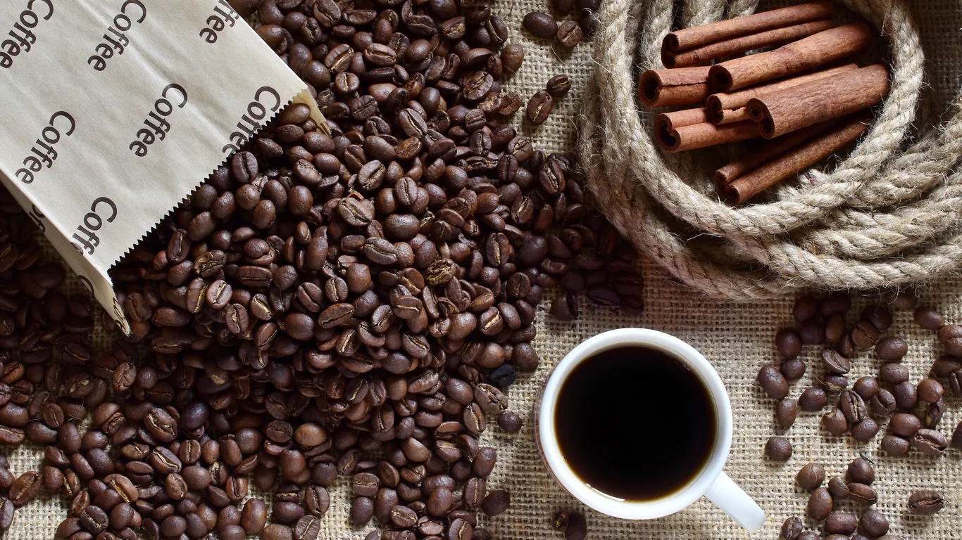 Panama specialty coffee - Coffee Beans Cinnamon Sticks And Cup On Burlap