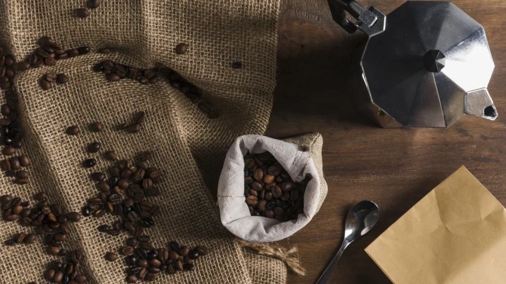 Panama specialty coffee - Scattered Coffee Beans Sackcloth Near Sack Coffee Maker Package