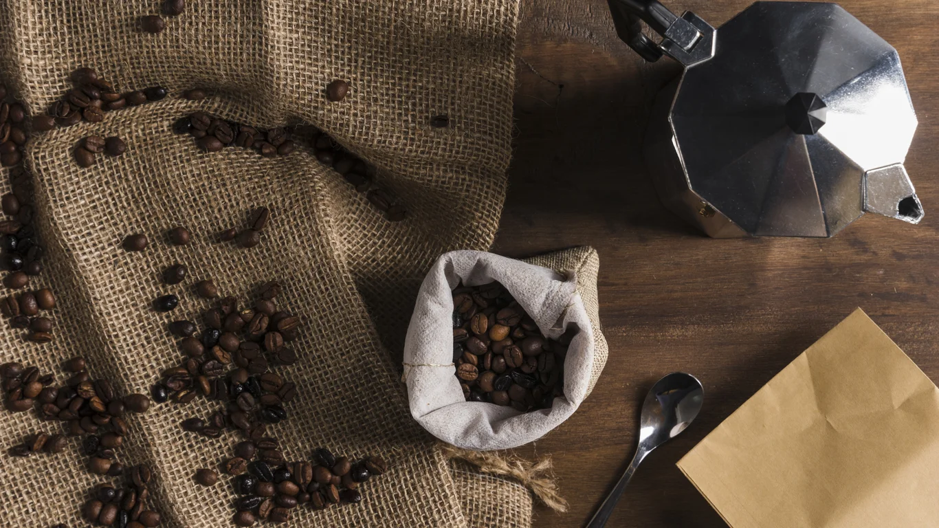 Panama specialty coffee - Scattered Coffee Beans Sackcloth Near Sack Coffee Maker Package